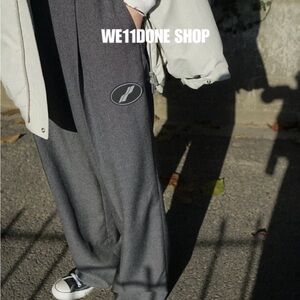 Grey We11done logo pants - the classic chic gender-neutral streetwear style